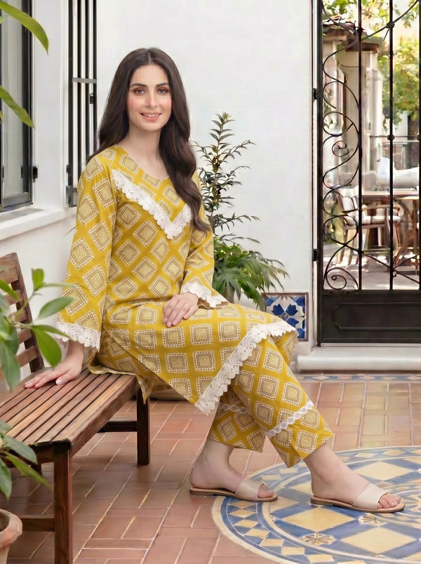 SAAYA Premium Lawn 2PC – Yellow Hand Block Printed Suit with Lace Detailing